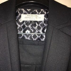 Two piece professional Tahari suit. Black. Lined.